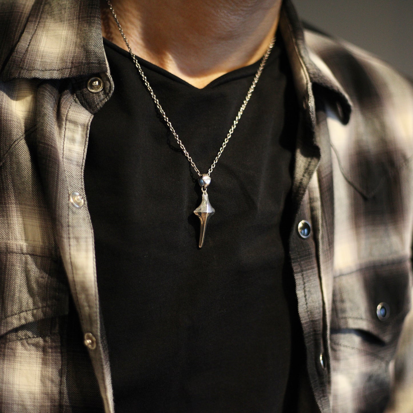 Crossed edge Pendant