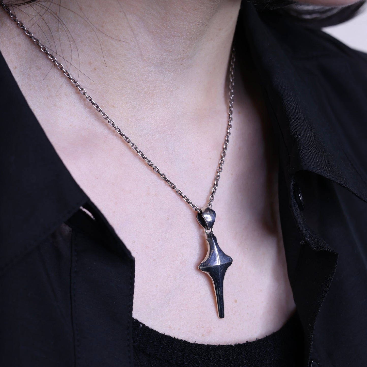 Crossed edge Pendant